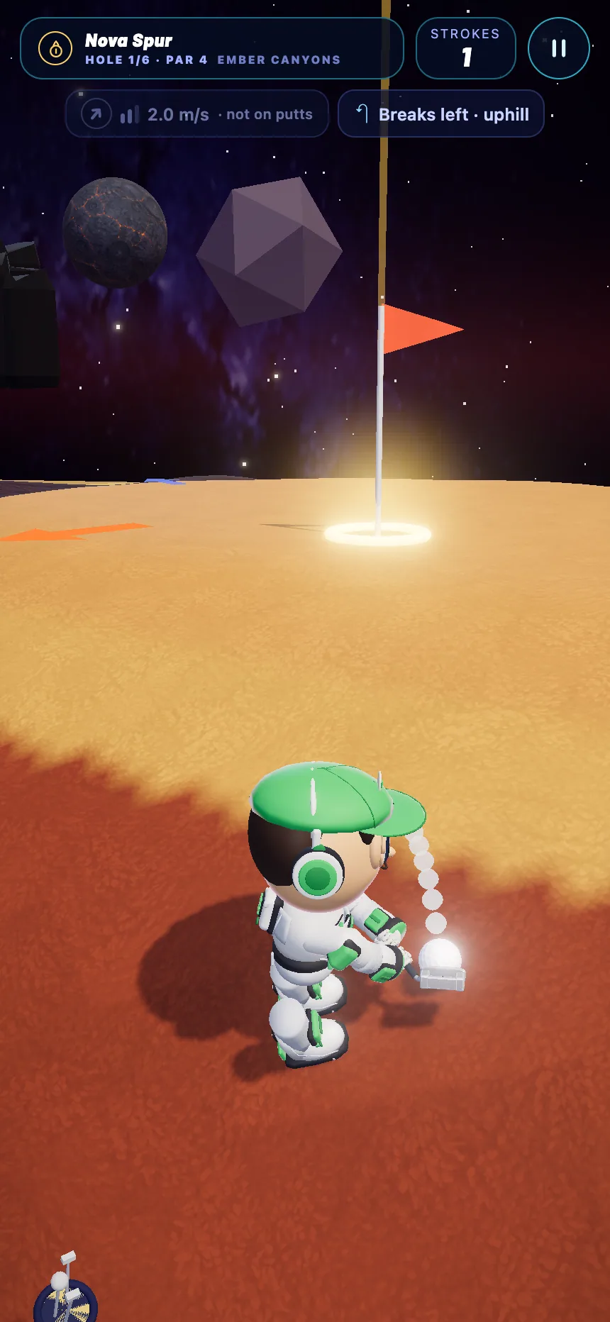 Ember Canyons green in the current build: the golfer lining up a putt on orange sand towards a glowing cup, with the break shown as 'Breaks left, uphill'.