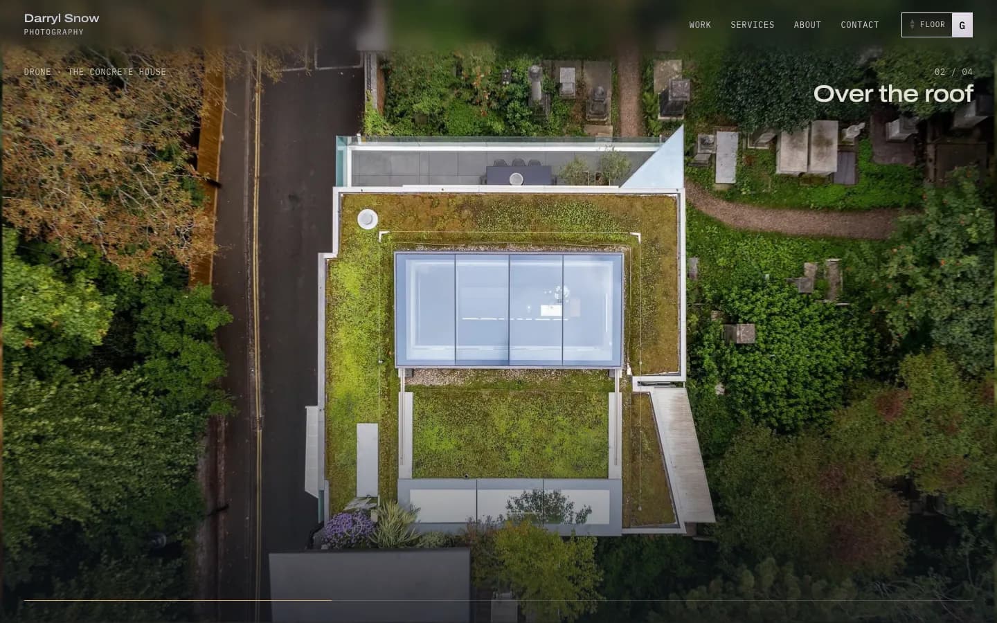 Drone fly-in frame looking straight down on a flat green roof with a large rooflight, captioned 'Over the roof'.