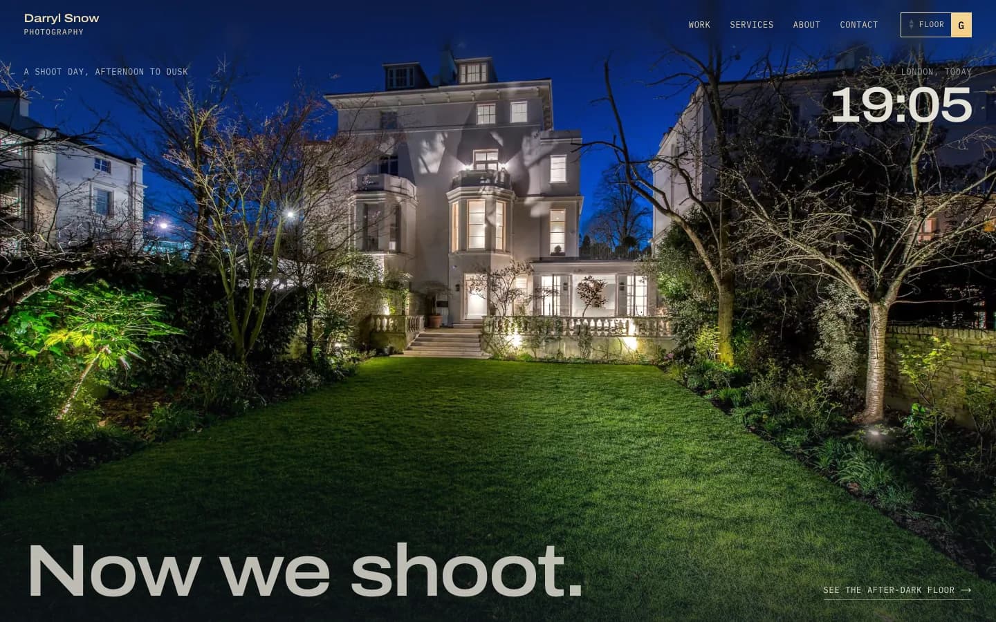 The same house at blue hour with every window and garden light on, the clock at 19:05 and the line 'Now we shoot.'
